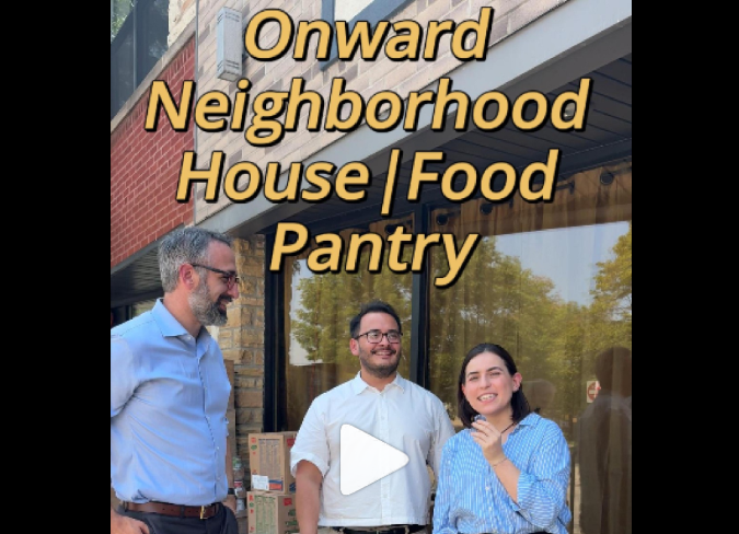 Yellow text "Onward Neighborhood House Food Pantry" with Rep Will Guzzardi and two Onward House staff holding a microphone in front of the Food Pantry.